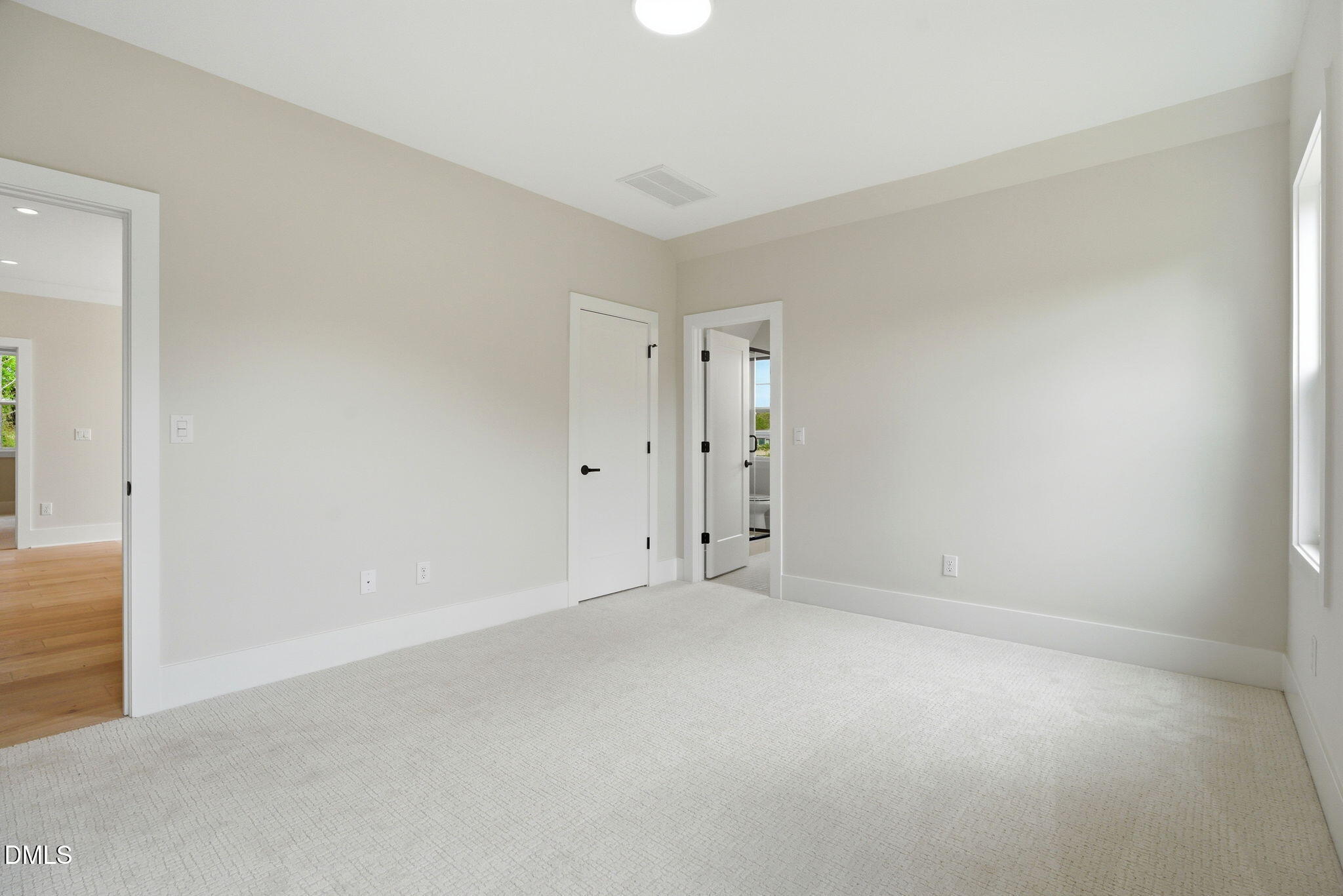 1304 Sanctuary Pond Drive Raleigh, NC 27606 - Photo 36 of 52 an empty room with an entryway