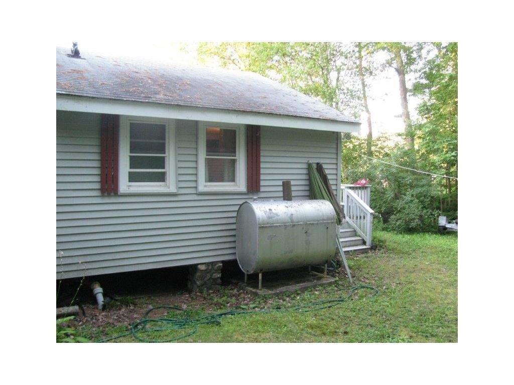40 Plummer Drive Raymond, ME 04071 - Photo 11 of 30 House facing road side.