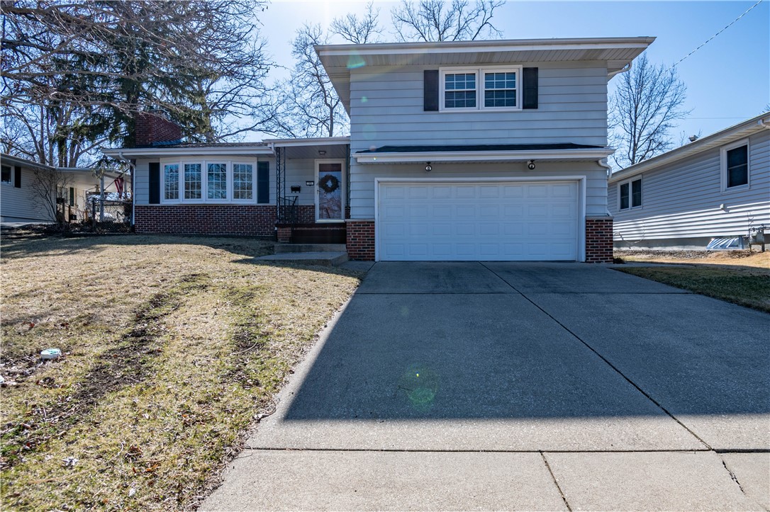 75 Ridgedale Drive Decatur, IL 62521 - Photo 2 of 26 a view of a house with a yard