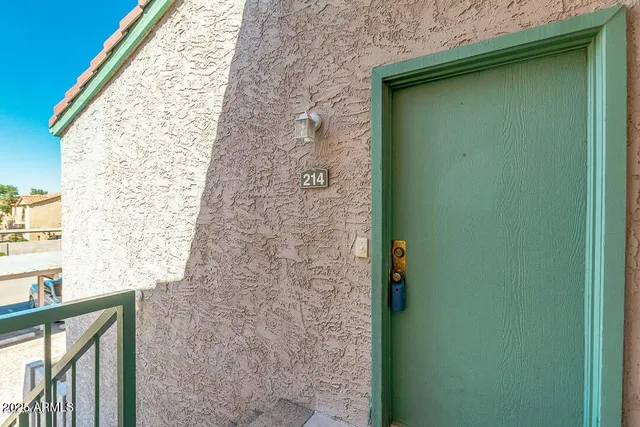 a view of an empty room and a window