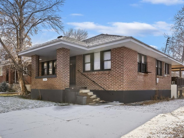 1265 Capitol Street Ogden, UT 84401 - Photo 1 of 1 View of snow covered exterior with brick siding