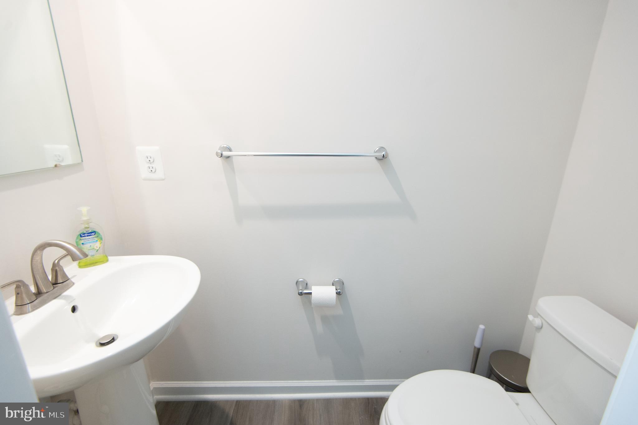 112 Mariners Way Cambridge, MD 21613 - Photo 26 of 29 a bathroom with a sink a toilet and shower