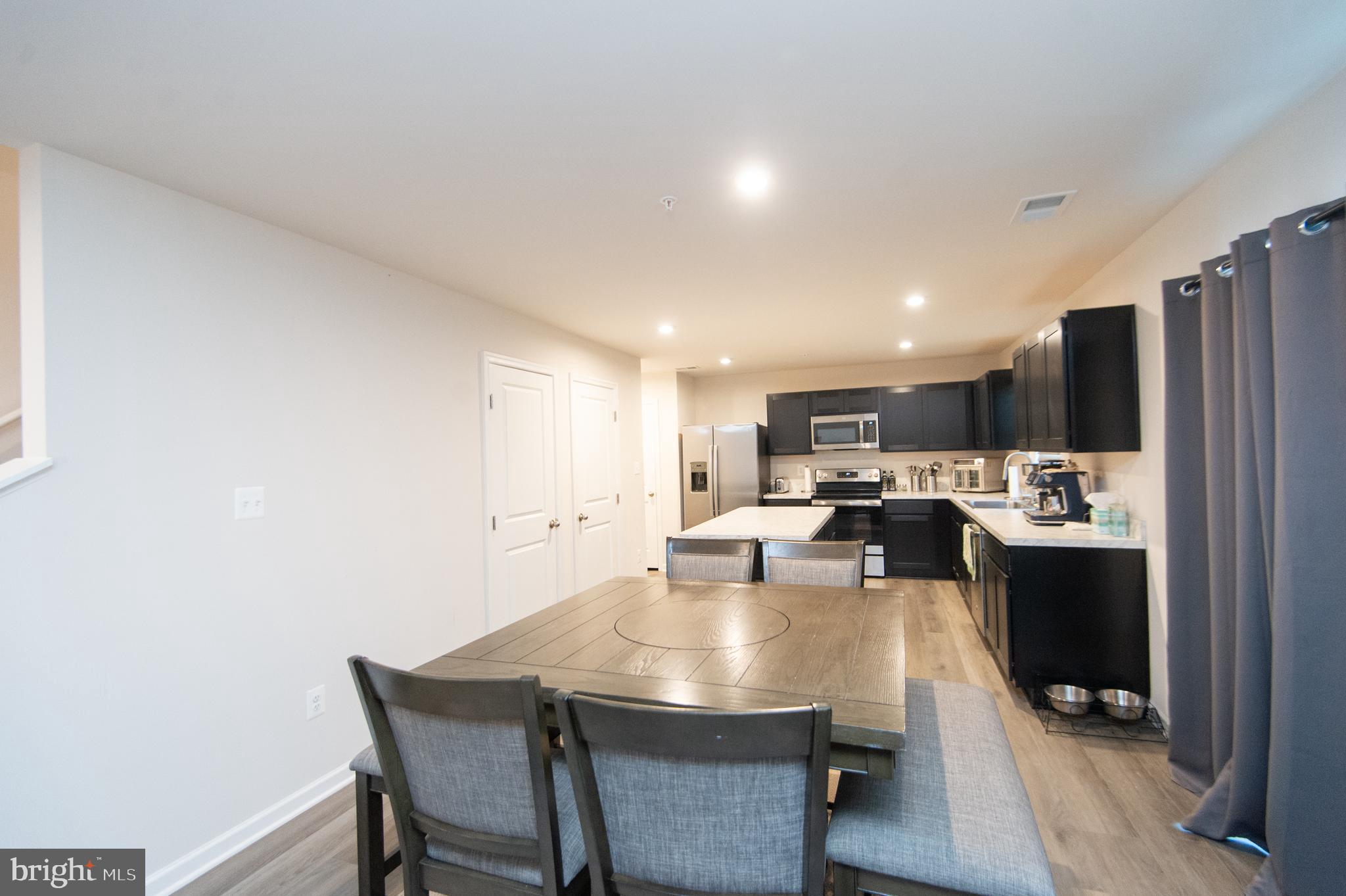 112 Mariners Way Cambridge, MD 21613 - Photo 5 of 29 a view of a dining room with furniture
