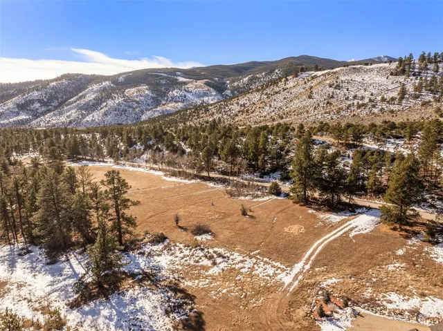 a view of a backyard with a mountain