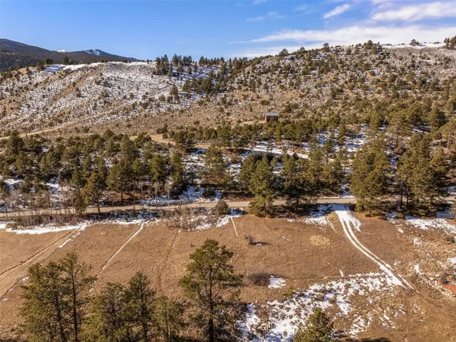 a view of mountain view with mountains in the background