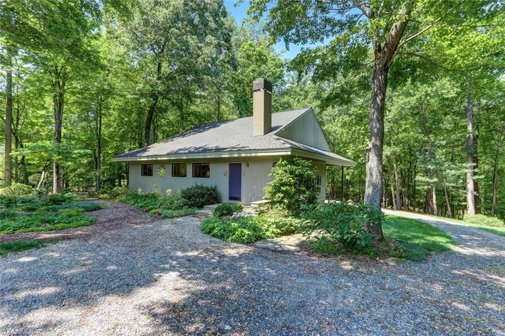 8110 Witty Road Summerfield, NC 27358 - Photo 29 of 30 Workshop 44' X 23' with rear open lower level storage