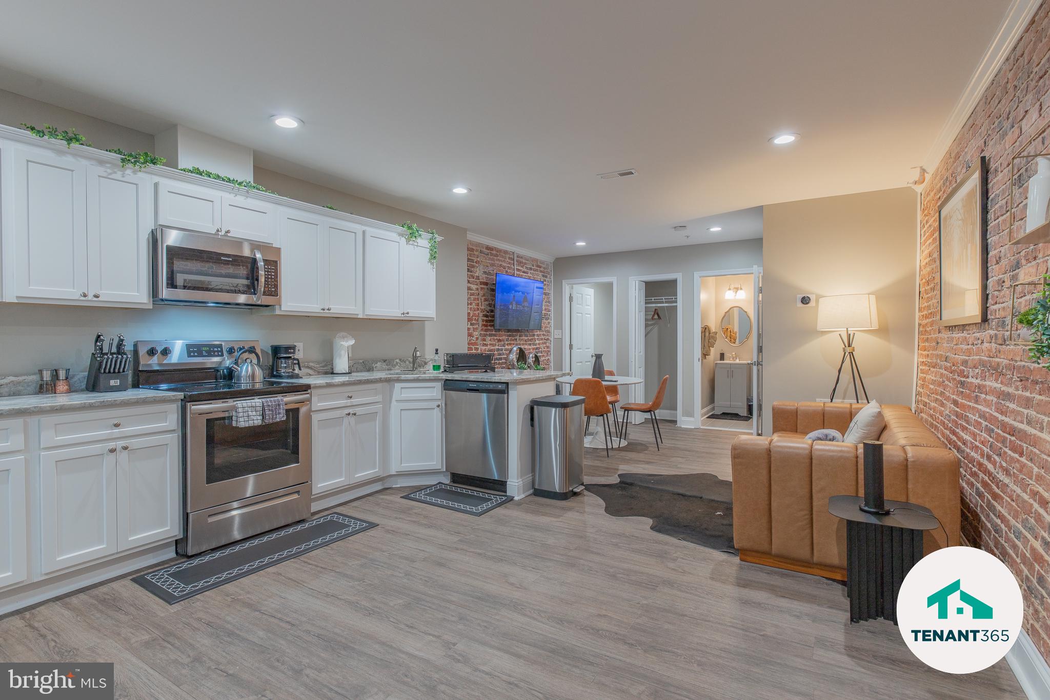 3221 Noble Street, Unit 4 Baltimore, MD 21224 - Photo 1 of 18 Chic urban kitchen with modern flair.