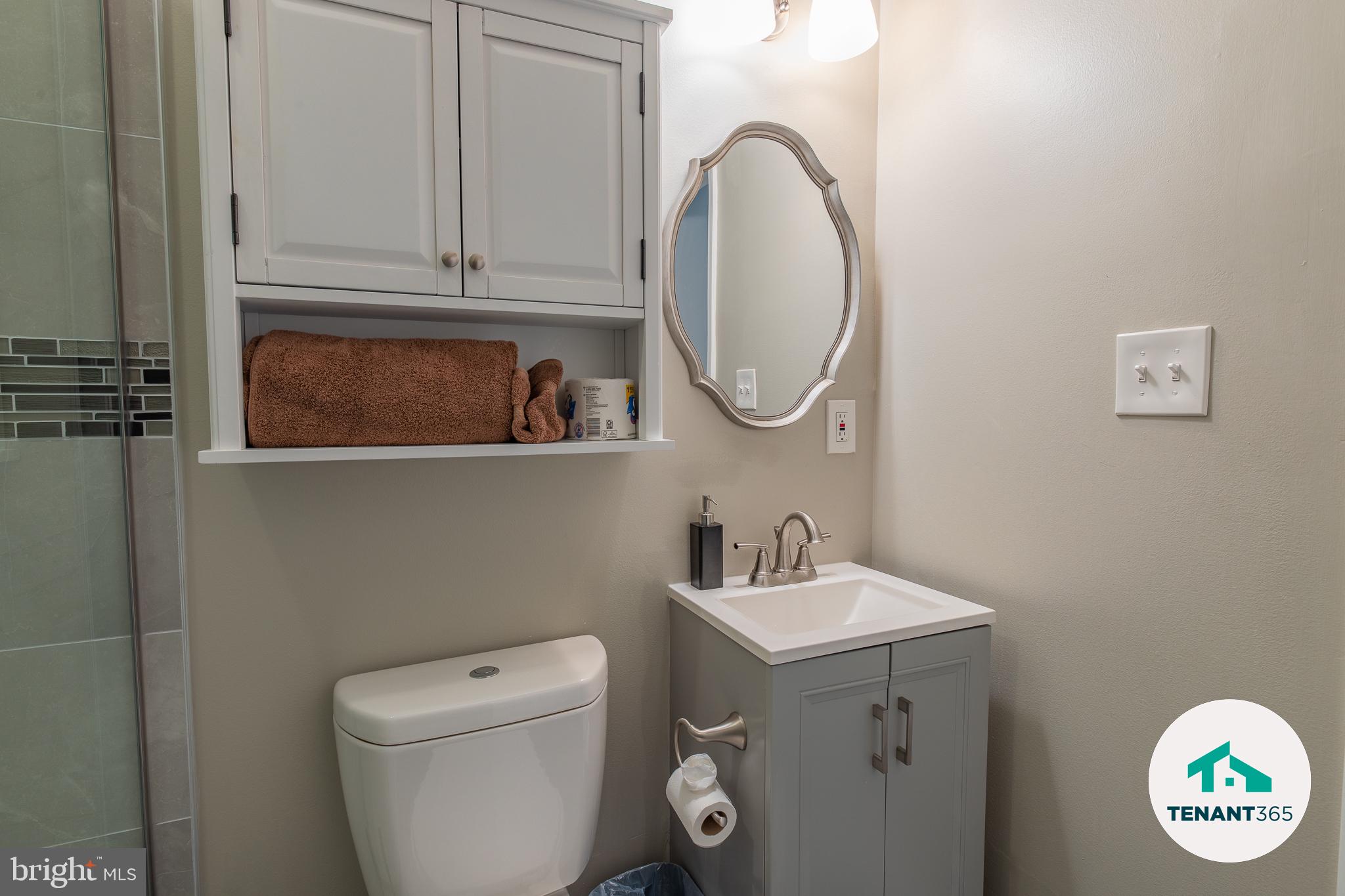 3221 Noble Street, Unit 4 Baltimore, MD 21224 - Photo 11 of 18 Modern bathroom with sleek finishes.
