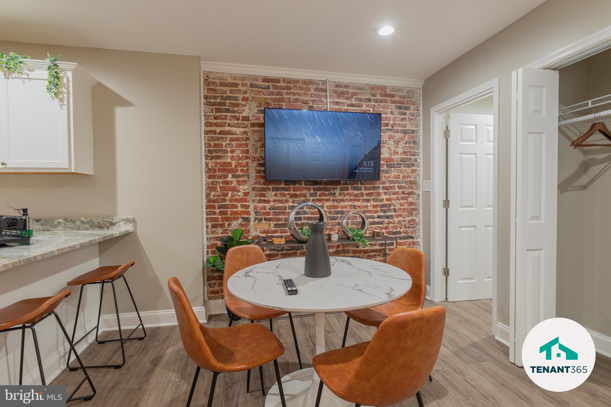 3221 Noble Street, Unit 4 Baltimore, MD 21224 - Photo 4 of 18 Charming space with exposed brick warmth.