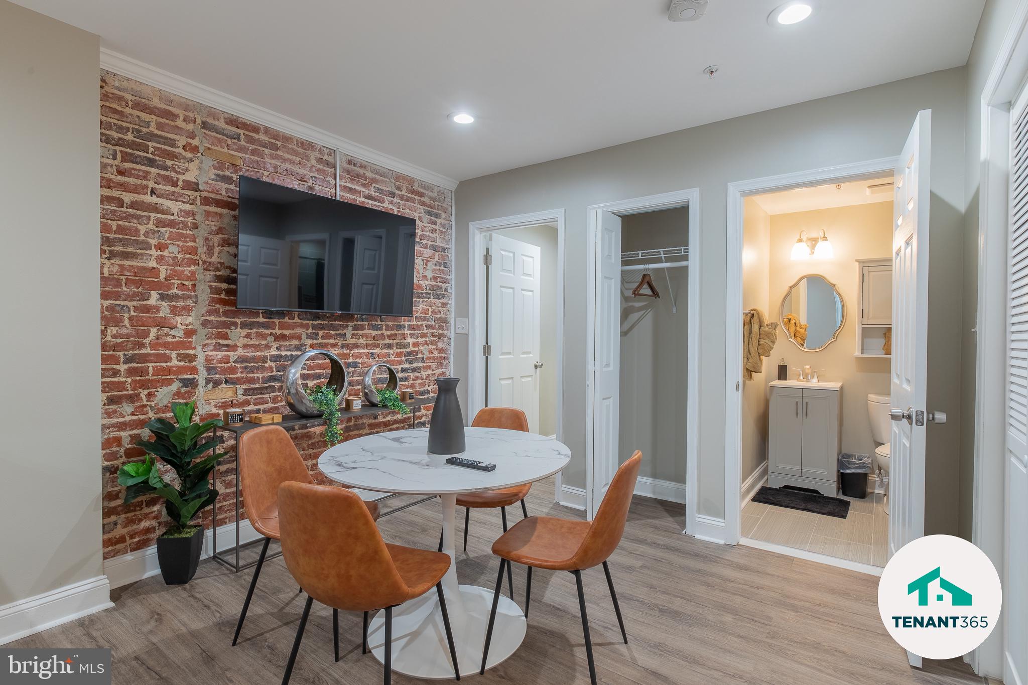 3221 Noble Street, Unit 4 Baltimore, MD 21224 - Photo 5 of 18 Chic urban retreat with exposed brick.