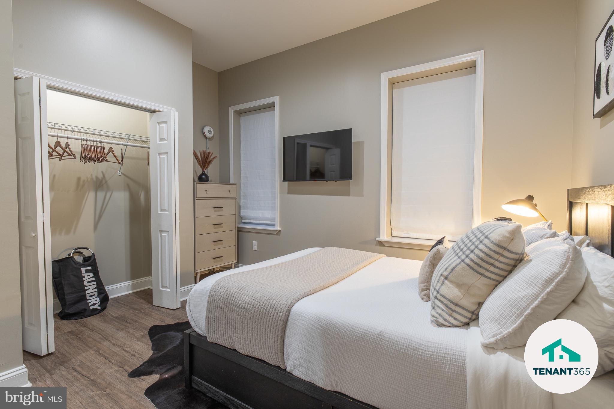 3221 Noble Street, Unit 4 Baltimore, MD 21224 - Photo 8 of 18 Cozy bedroom with modern touches.