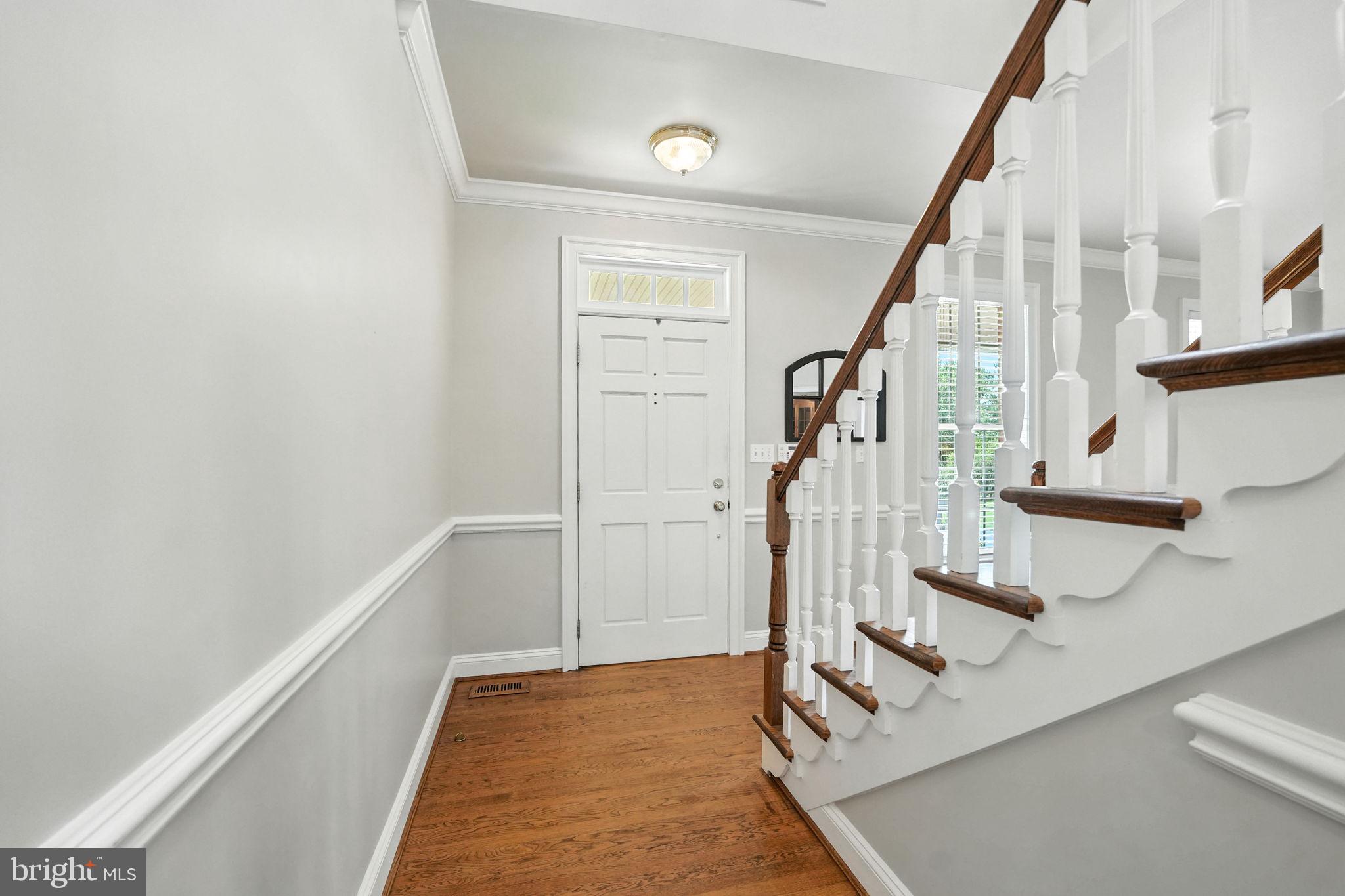 12564 Eggbornsville Road Culpeper, VA 22701 - Photo 19 of 62 a view of entryway with wooden floor and stairs