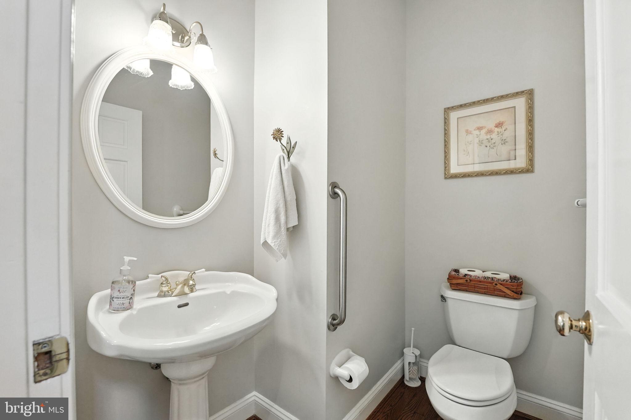 12564 Eggbornsville Road Culpeper, VA 22701 - Photo 23 of 62 a bathroom with a toilet sink and mirror