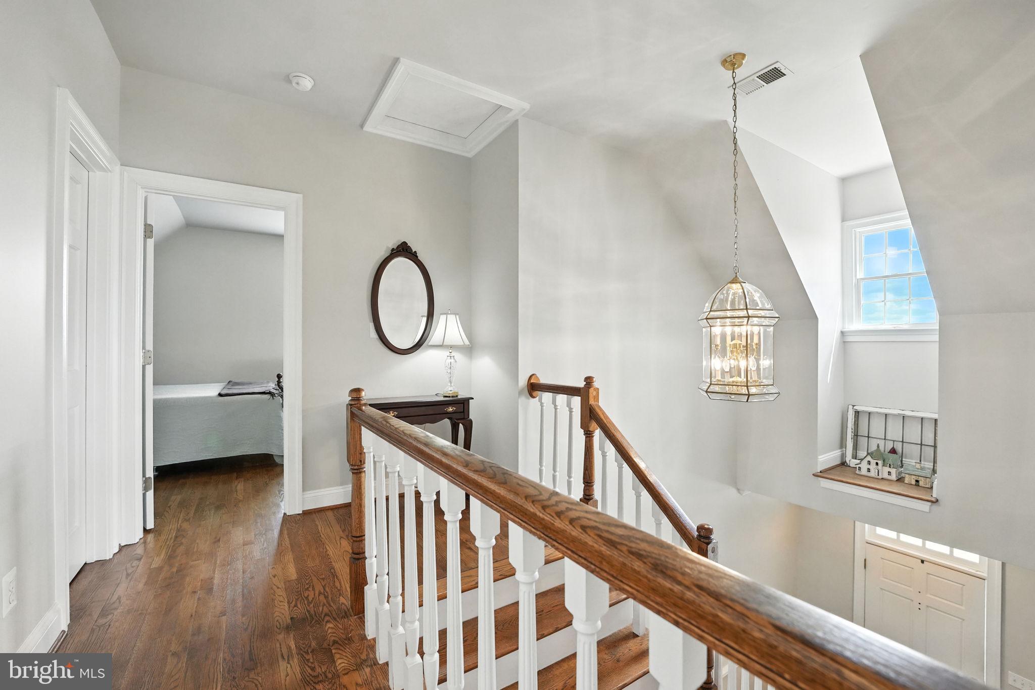 12564 Eggbornsville Road Culpeper, VA 22701 - Photo 39 of 62 a view of a room that has a lot of windows and wooden floor