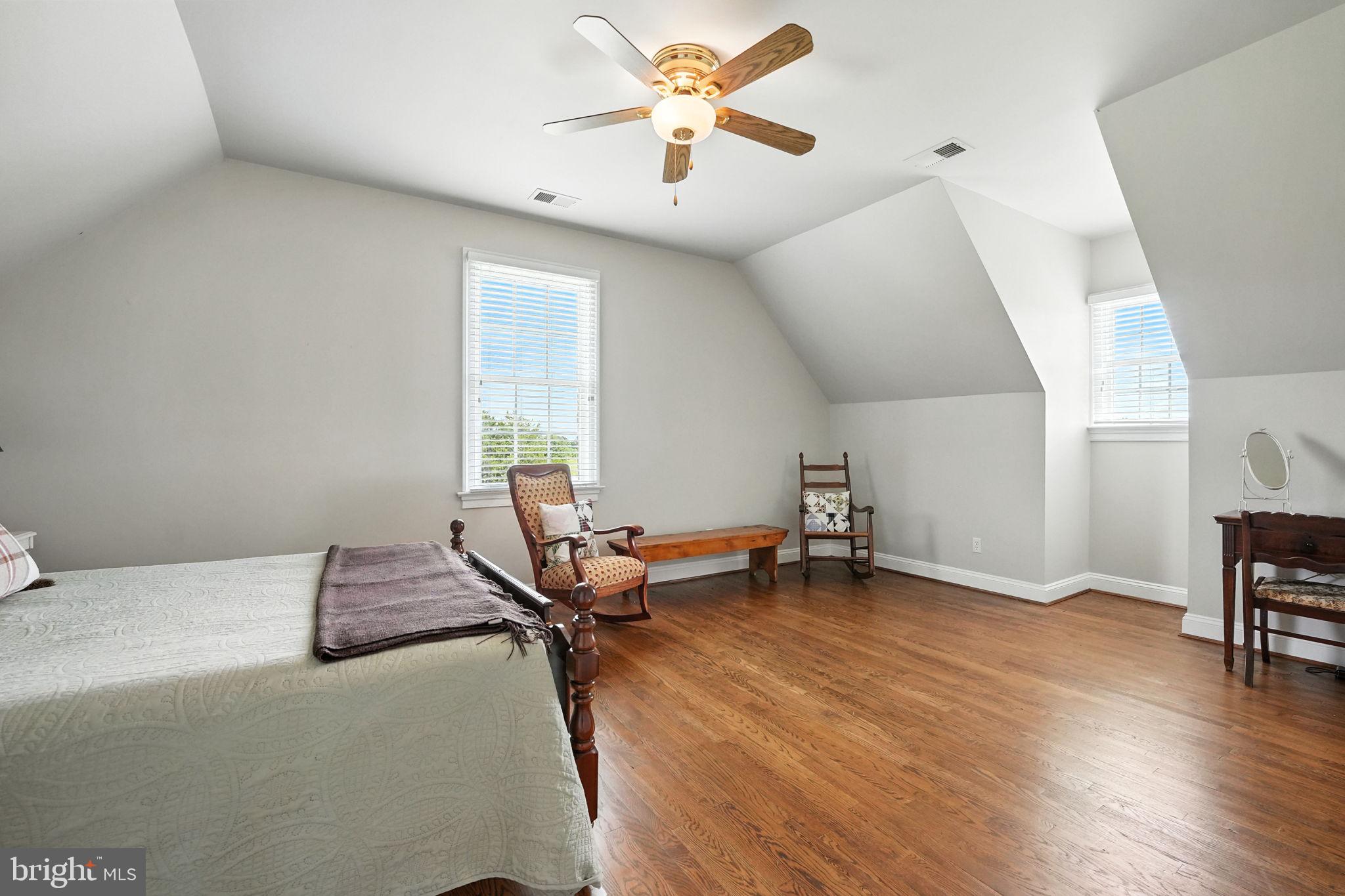 12564 Eggbornsville Road Culpeper, VA 22701 - Photo 42 of 62 a bedroom with furniture and a window