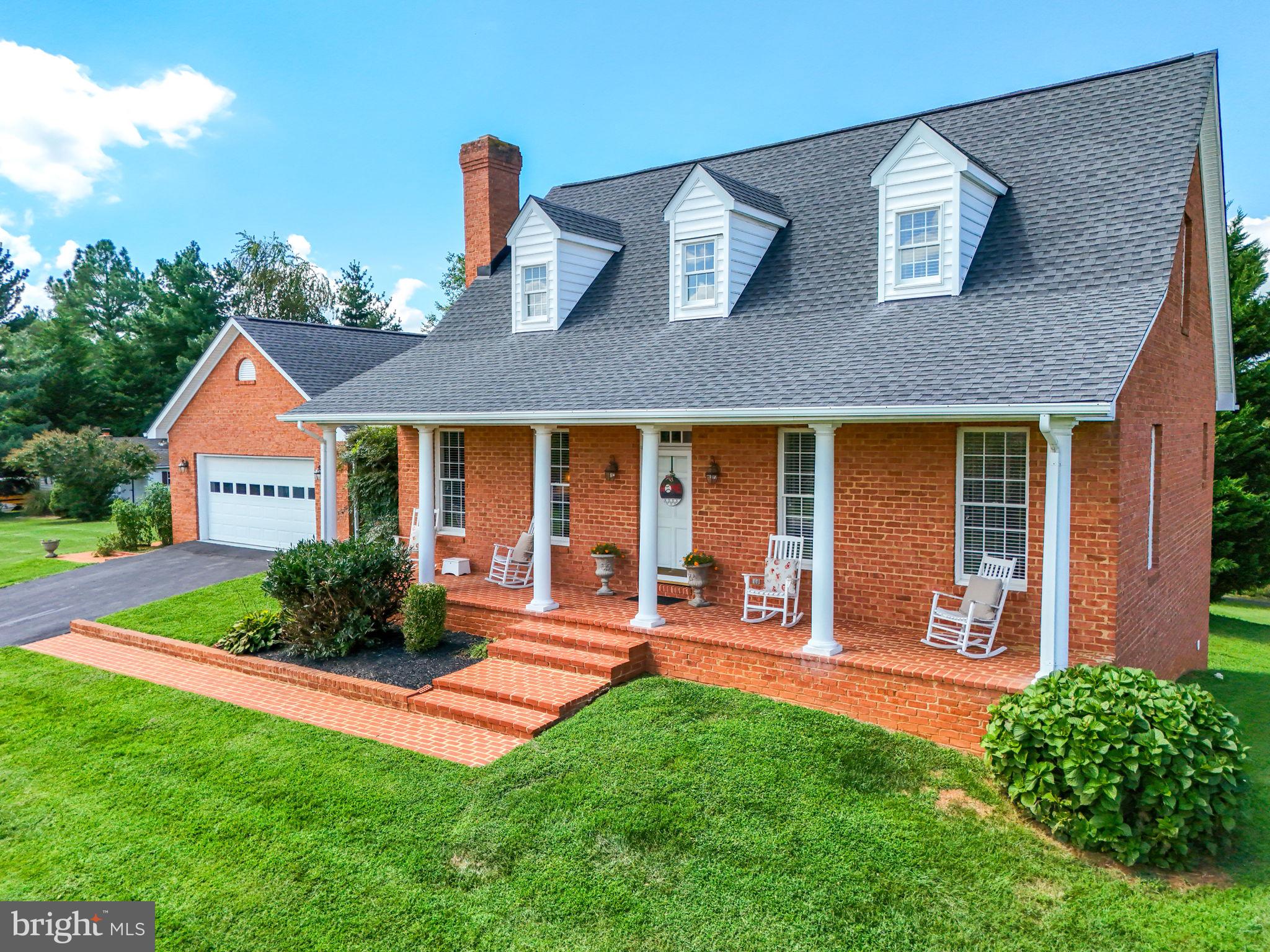 12564 Eggbornsville Road Culpeper, VA 22701 - Photo 7 of 62 a front view of a house with a yard