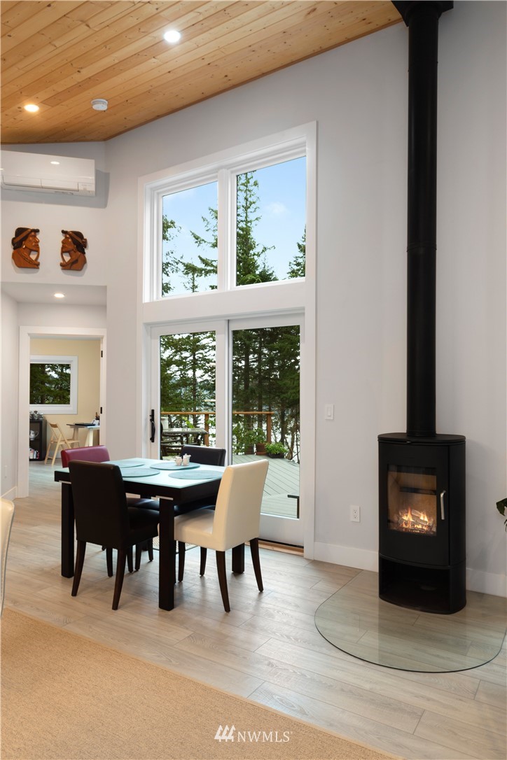 884 McDonald Road, Unit EXT Quilcene, WA 98376 - Photo 15 of 38 a view of a dining room with furniture window and outside view