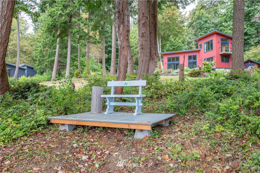884 McDonald Road, Unit EXT Quilcene, WA 98376 - Photo 3 of 38 a house view with a garden space