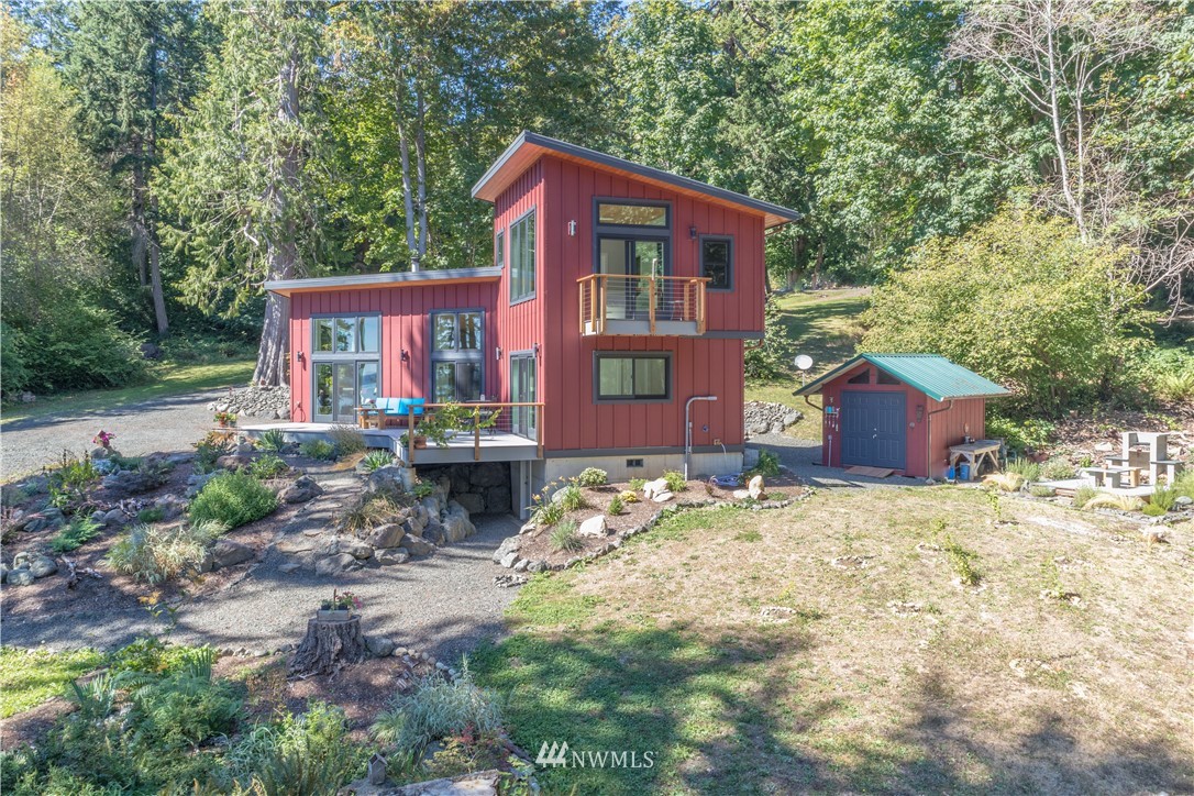 884 McDonald Road, Unit EXT Quilcene, WA 98376 - Photo 36 of 38 a front view of a house with garden