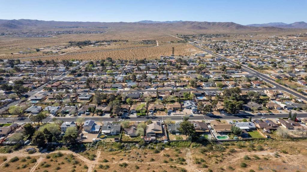 0 Between Vulcon Ave And Hood Avenue Ridgecrest, CA 93555 - Photo 7 of 42 an aerial view of residential house with outdoor space and trees