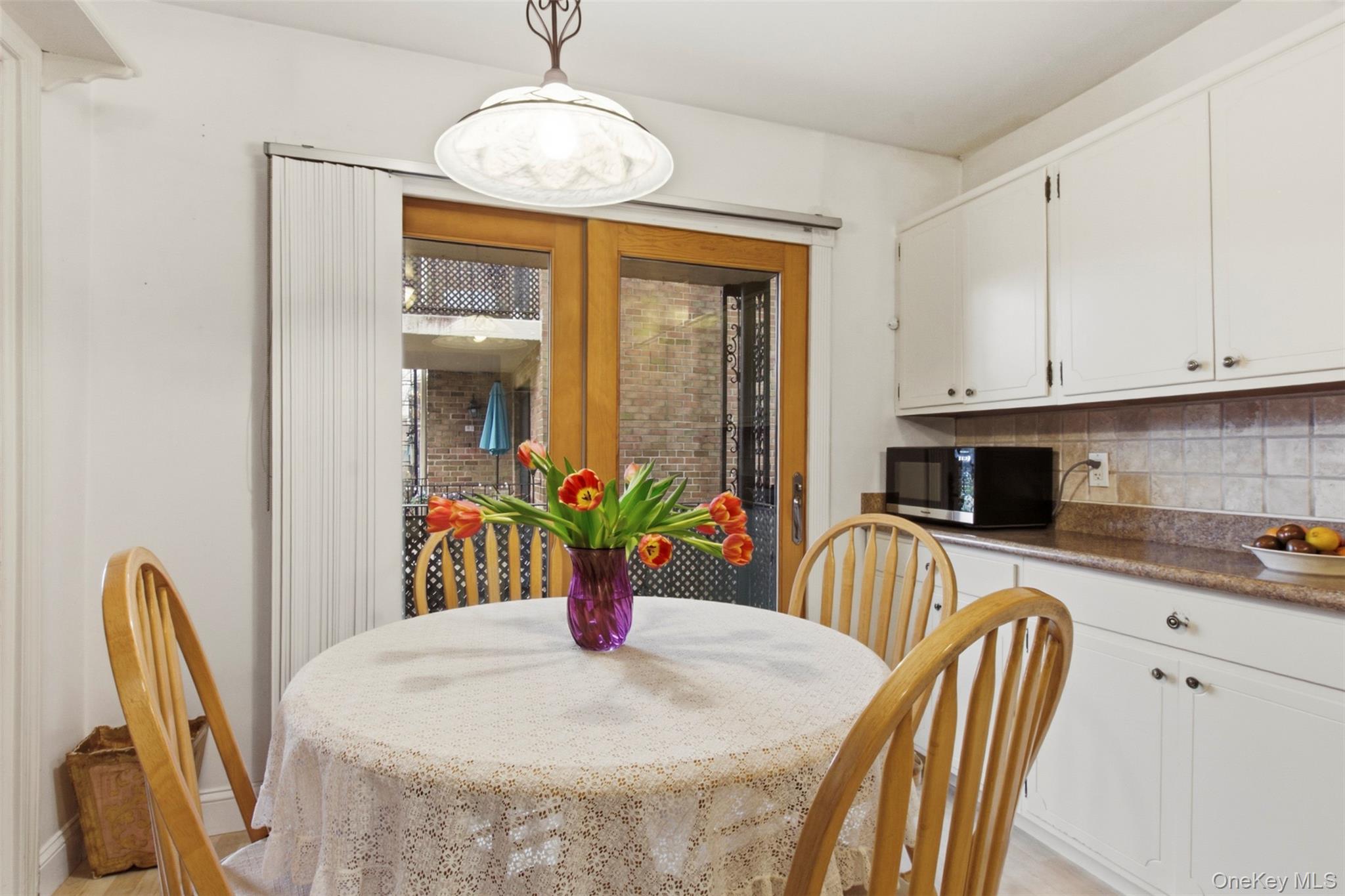 100 Gateway Road, Unit 192N Yonkers, NY 10703 - Photo 8 of 16 a view of a dining room with furniture