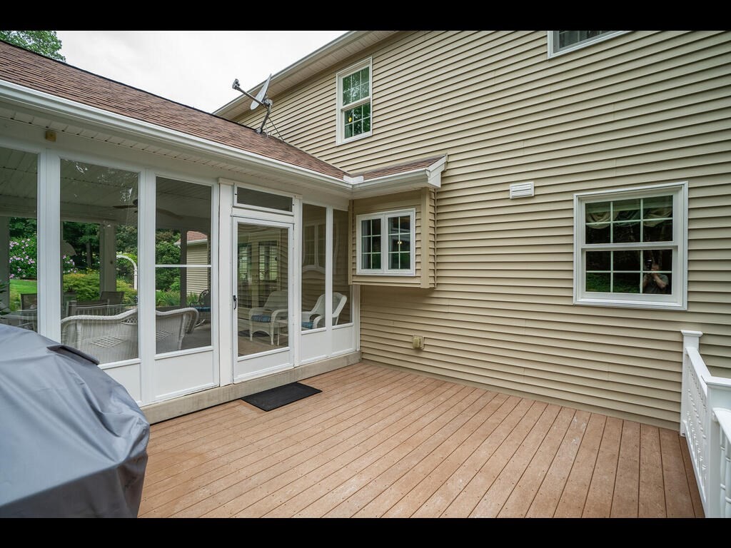 20 Paradise Lake Road Monson, MA 01057 - Photo 11 of 42 a view of a house with a balcony