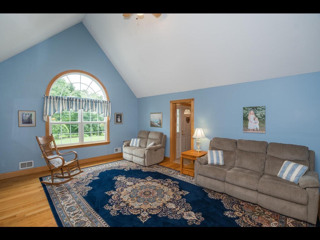 20 Paradise Lake Road Monson, MA 01057 - Photo 16 of 42 a living room with furniture and a large window
