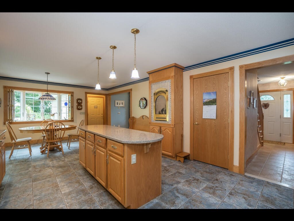 20 Paradise Lake Road Monson, MA 01057 - Photo 24 of 42 a view of living room kitchen with stainless steel appliances granite countertop lots of counter top space