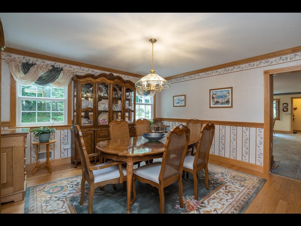 20 Paradise Lake Road Monson, MA 01057 - Photo 28 of 42 a view of a dining room with furniture window and outside view