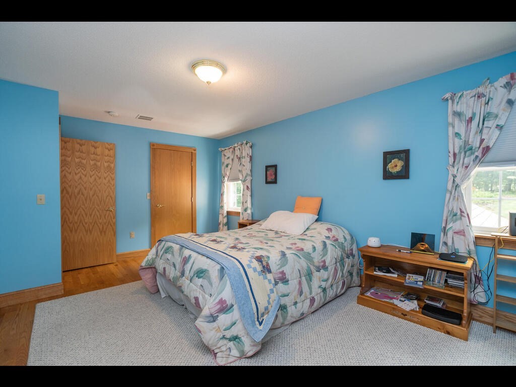 20 Paradise Lake Road Monson, MA 01057 - Photo 40 of 42 a bedroom with a bed and a window