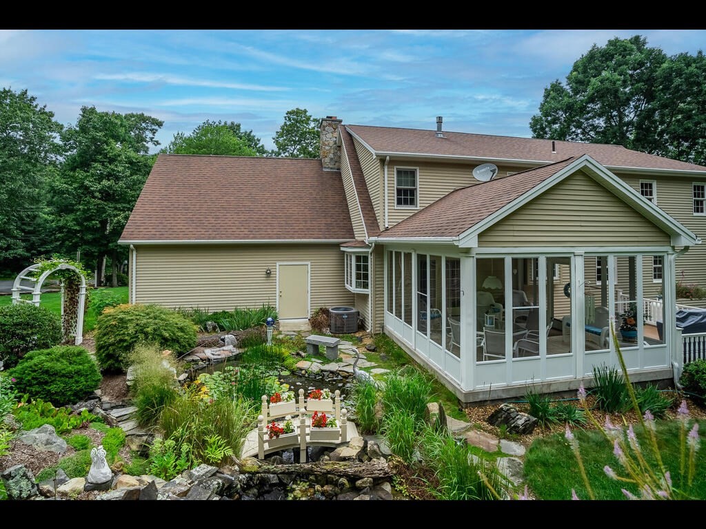 20 Paradise Lake Road Monson, MA 01057 - Photo 7 of 42 a aerial view of a house with a yard
