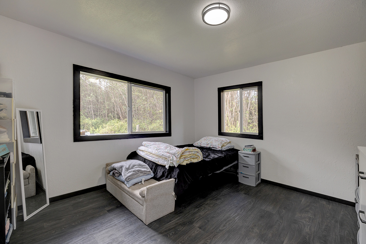 18-1248 Thorne Parkway Mountain View, HI 96771 - Photo 14 of 25 a living room with furniture and window