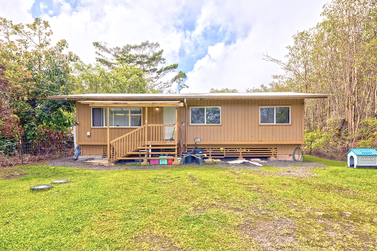 18-1248 Thorne Parkway Mountain View, HI 96771 - Photo 2 of 25 a view of a house with a yard and sitting area