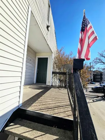 a view of a wooden floor and a balcony view