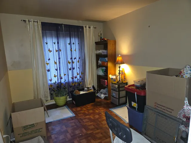 a white toilet sitting next to a bathroom sink and a shower