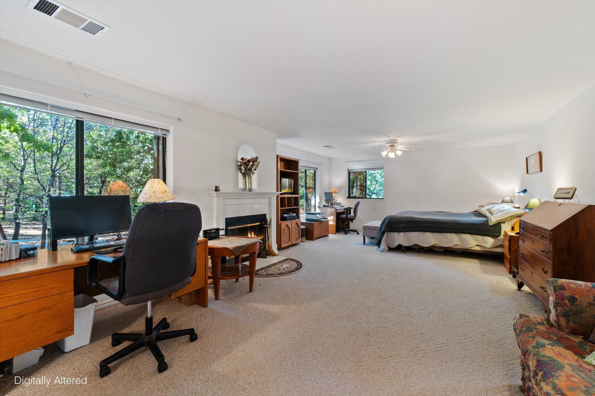 26997 Lookout Mountain Road Oak Run, CA 96069 - Photo 29 of 92 a view of a livingroom with workspace and a window