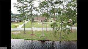 a view of a garden from a balcony