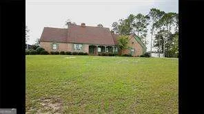 a view of a house with garden