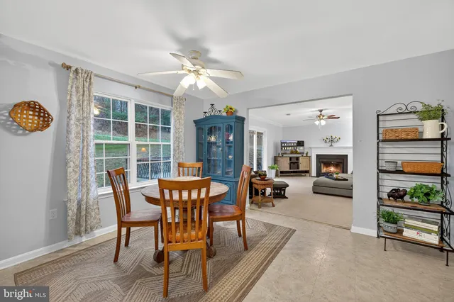 a view of a deck with furniture and wooden floor