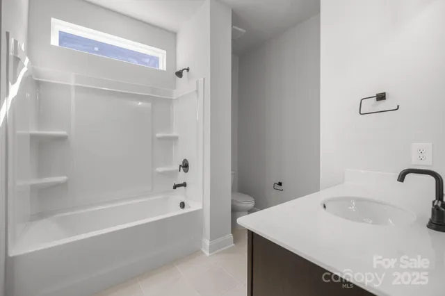 a bathroom with a sink and a bathtub