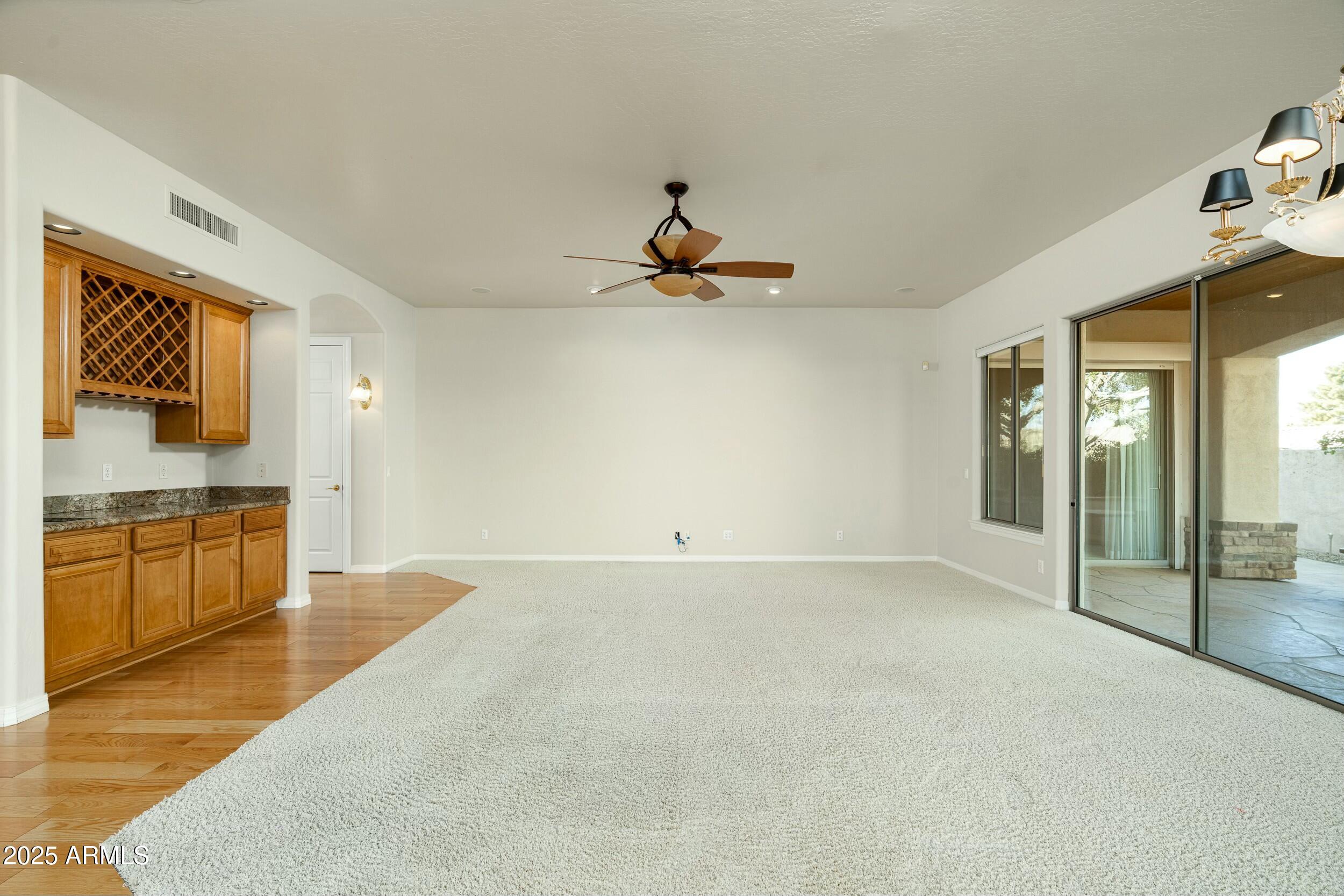 2646 East Spring Road Phoenix, AZ 85032 - Photo 14 of 42 Family Room with a Wet Bar