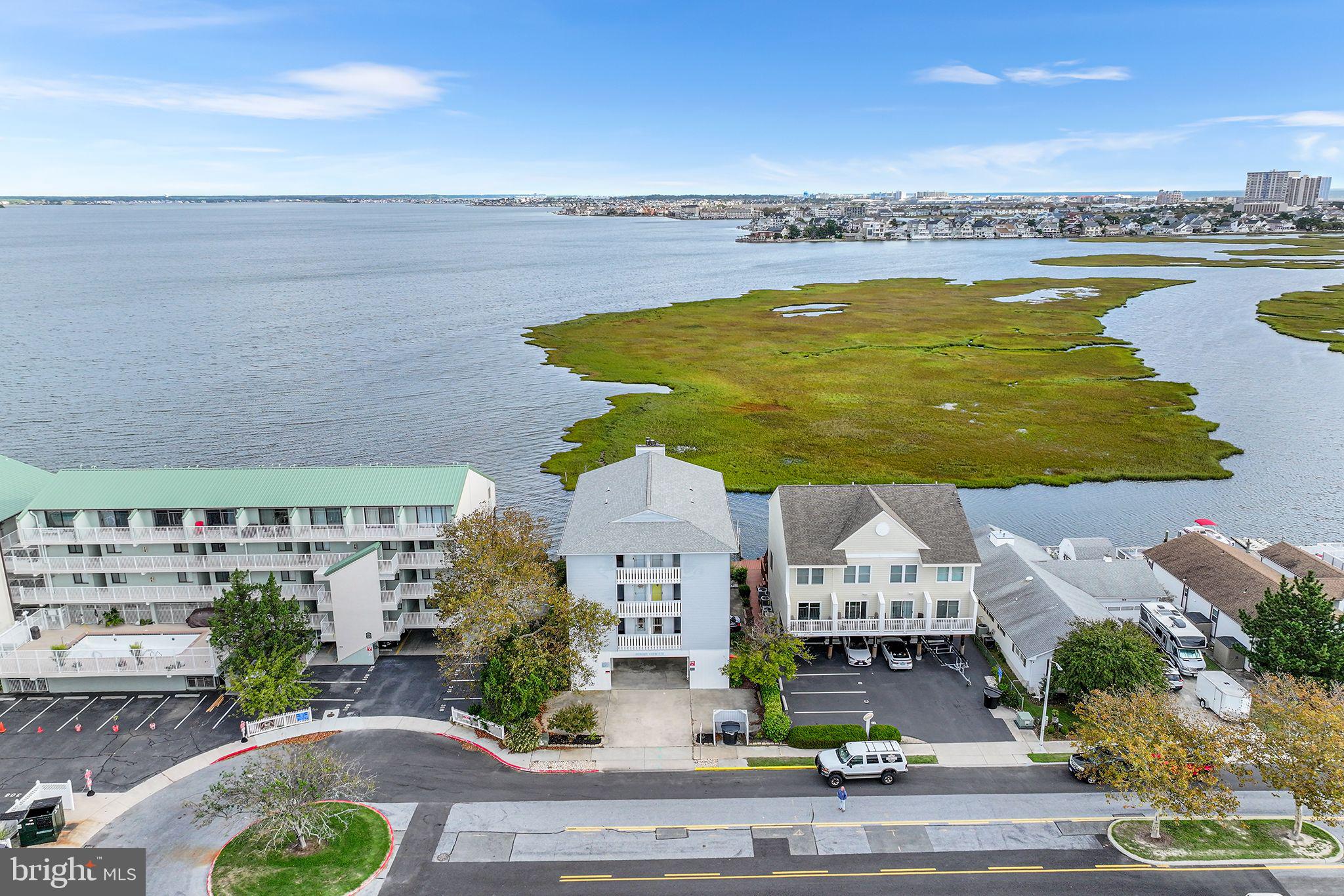 772 94th Street, Unit A Ocean City, MD 21842 - Photo 1 of 36 an aerial view of residential houses with outdoor space and ocean view