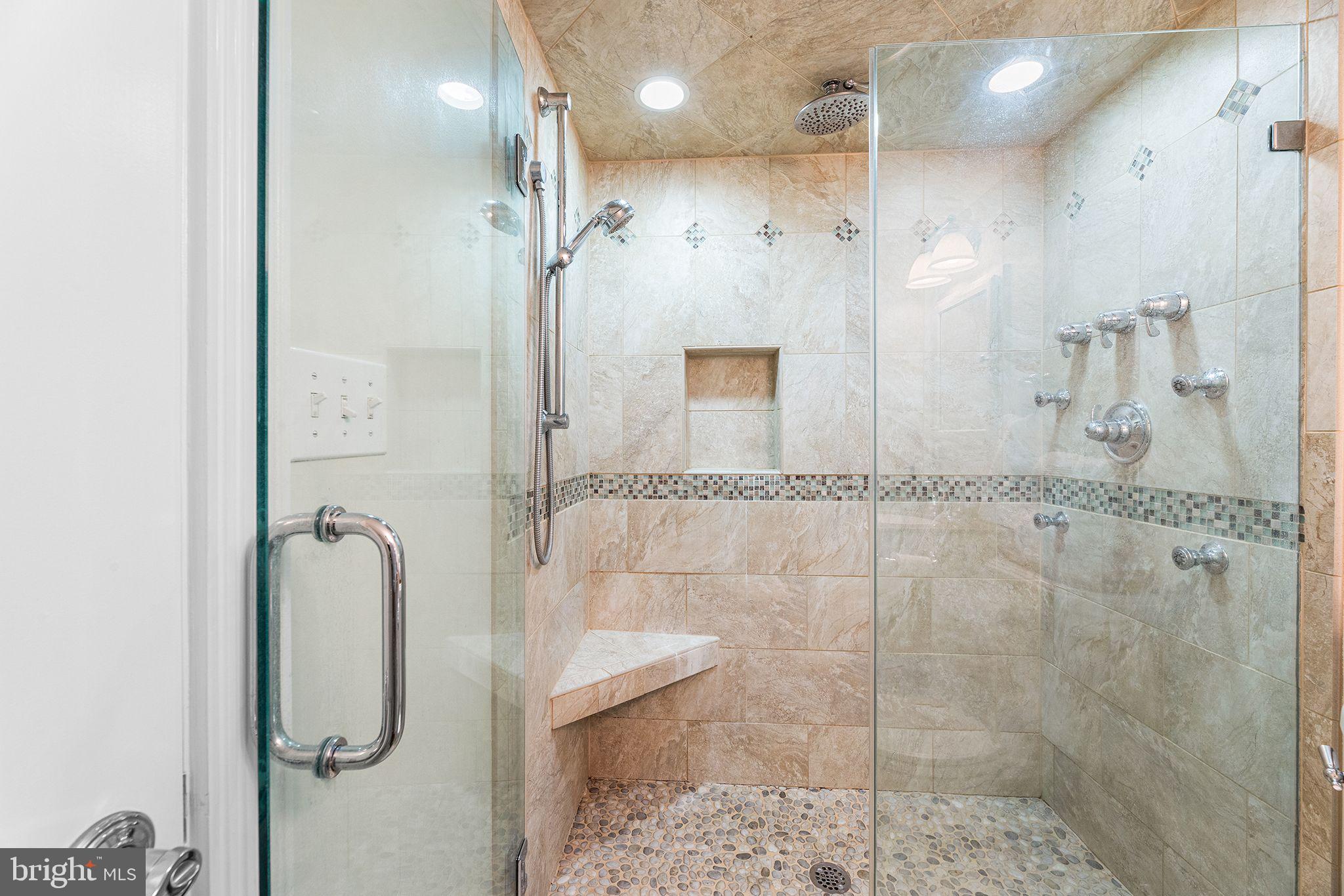 772 94th Street, Unit A Ocean City, MD 21842 - Photo 22 of 36 a bathroom with a shower