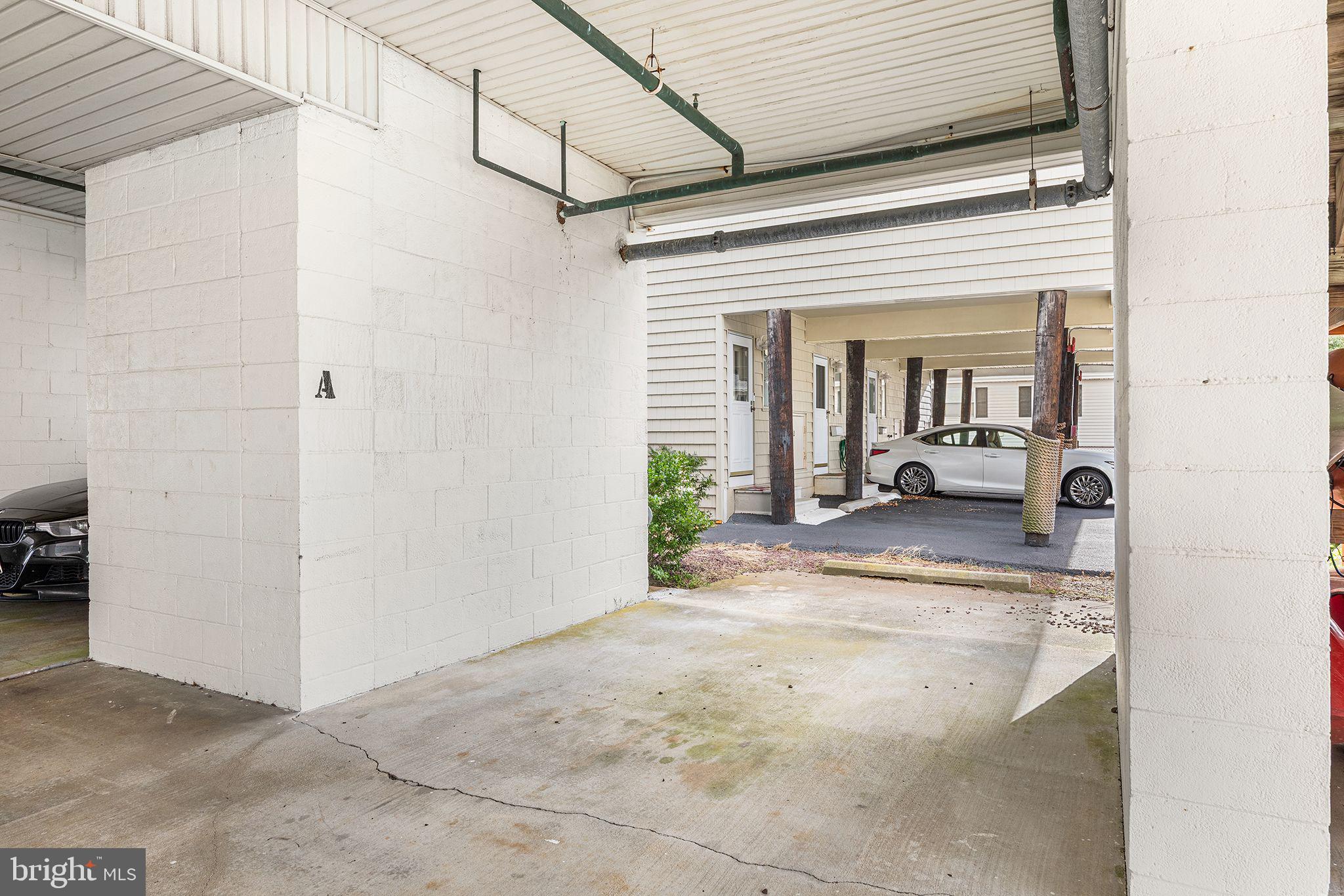 772 94th Street, Unit A Ocean City, MD 21842 - Photo 35 of 36 a view of a living room and a hallway