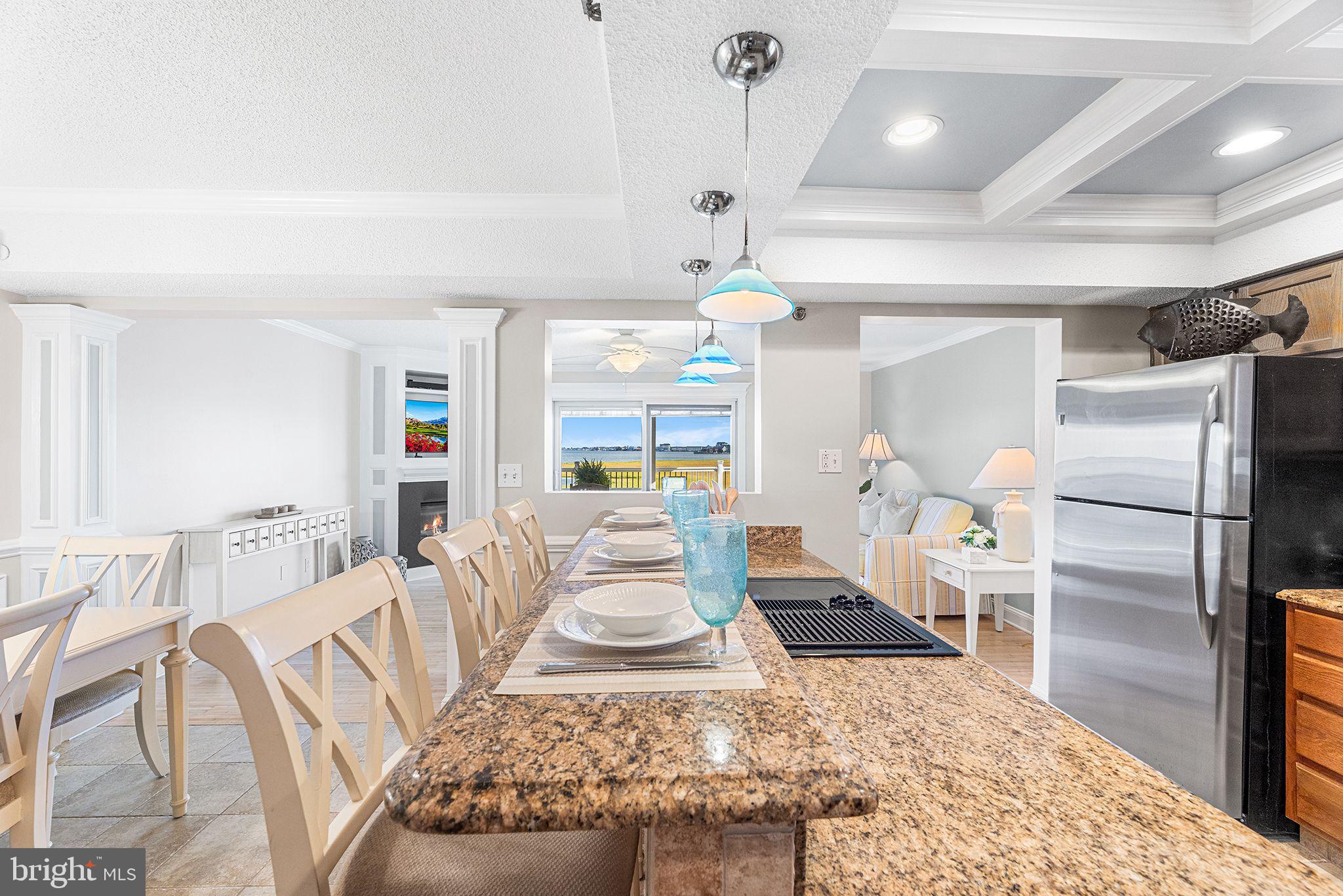 772 94th Street, Unit A Ocean City, MD 21842 - Photo 10 of 36 a living room with furniture and a kitchen view