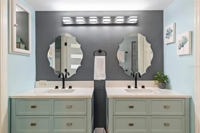 a bedroom with a bed and a table