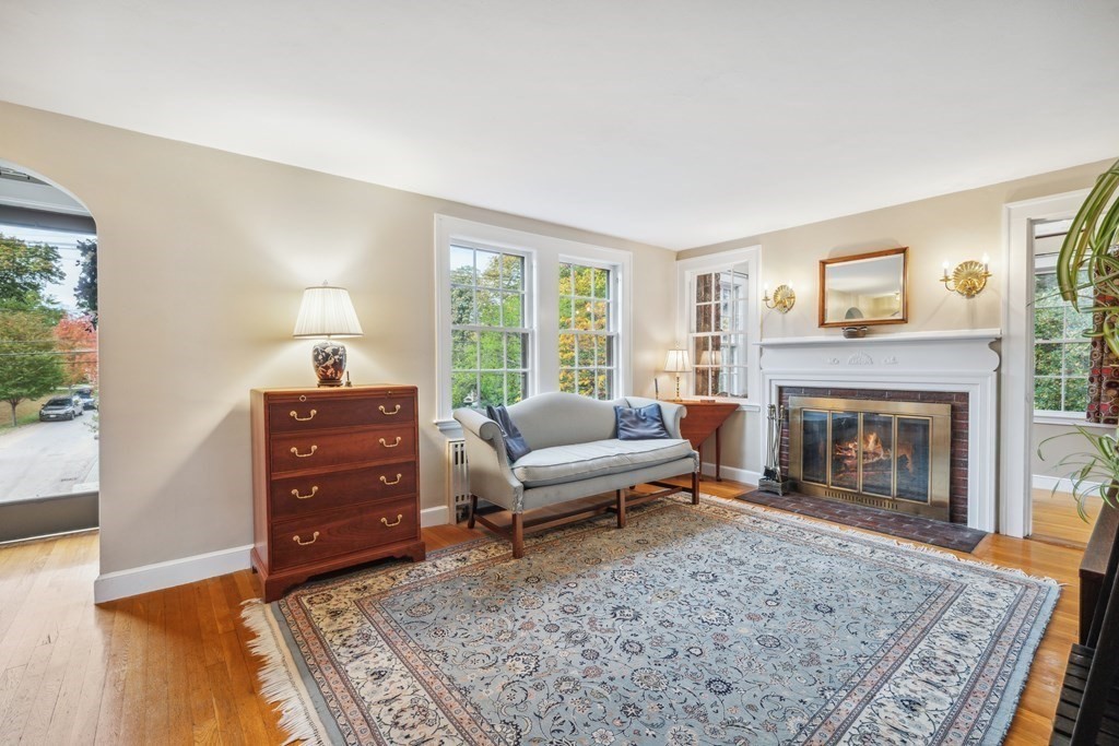 74 Middle Street Lexington, MA 02421 - Photo 4 of 37 a living room with furniture and a fireplace