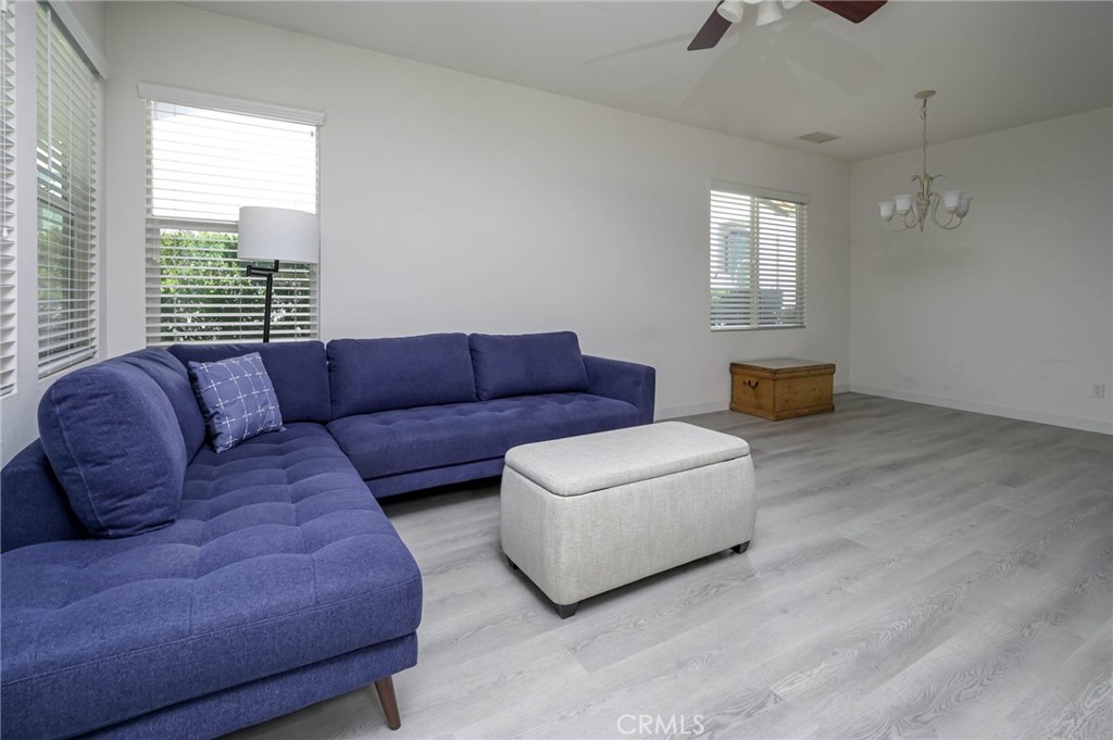9141 Filaree Court Corona, CA 92883 - Photo 19 of 54 a living room with furniture