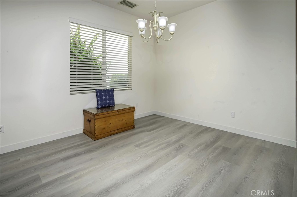 9141 Filaree Court Corona, CA 92883 - Photo 20 of 54 a view of an empty room with a window