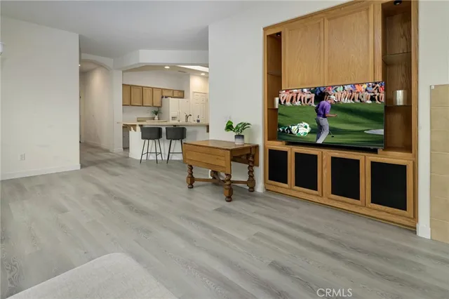 a bathroom with a double vanity sink mirror and shower